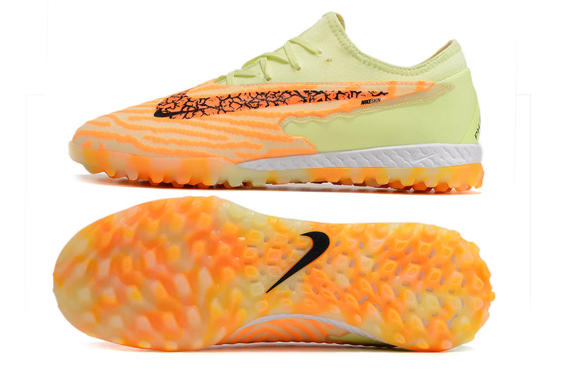 Chuteira de Campo Nike React Phantom GX Pro TF - Laranja/verde