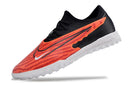 Chuteira de Campo Nike React Phantom GX Pro TF - Preto/Laranja