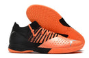 Chuteiras de futebol Puma Future Z 1.3 Teazer IC - Laranja/Preto