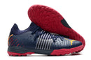 Chuteiras de futebol Puma Future Z TF/MG - Azul Escuro/Vemelho
