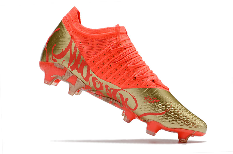 Chuteira de Campo Puma Future Z 1.3 Teazer FG - Laranja/Ouro escovado