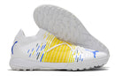 Chuteiras de futebol Puma Future Z TF/MG - Branca/Amarelo