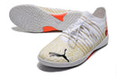 Chuteiras de futebol Puma Future Z 1.3 Teazer IC - Branco/Laranja