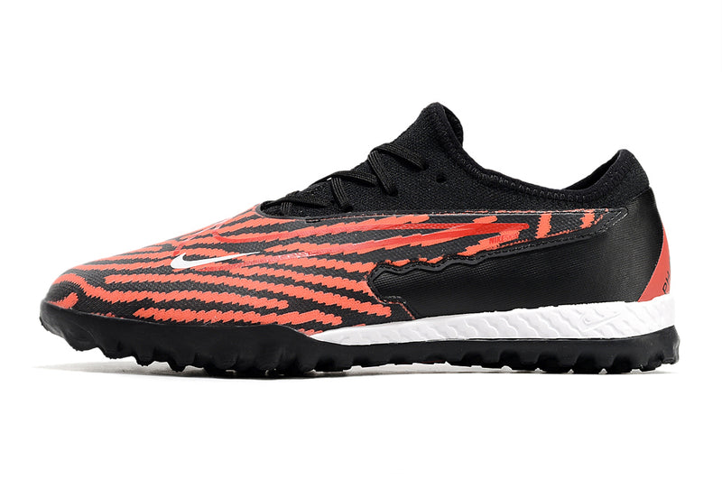 Chuteira de Campo Nike React Phantom GX Pro TF - Preto/Laranja