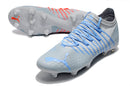 Chuteira de Campo Puma Future Z 1.3 Teazer FG - Cinza/Azul/Laranja