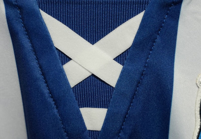 Camisa Real Sociedad l 24/25 - Torcedor Macron Masculina - Branca e azul