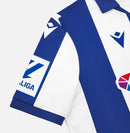 Camisa Real Sociedad l 24/25 - Torcedor Macron Masculina - Branca e azul