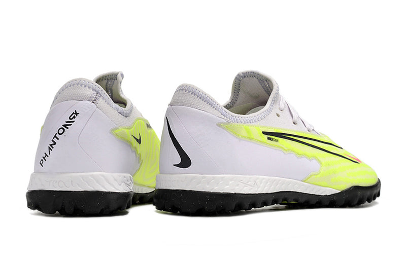 Chuteira de Campo Nike React Phantom GX Pro TF - Branco/Amarelo