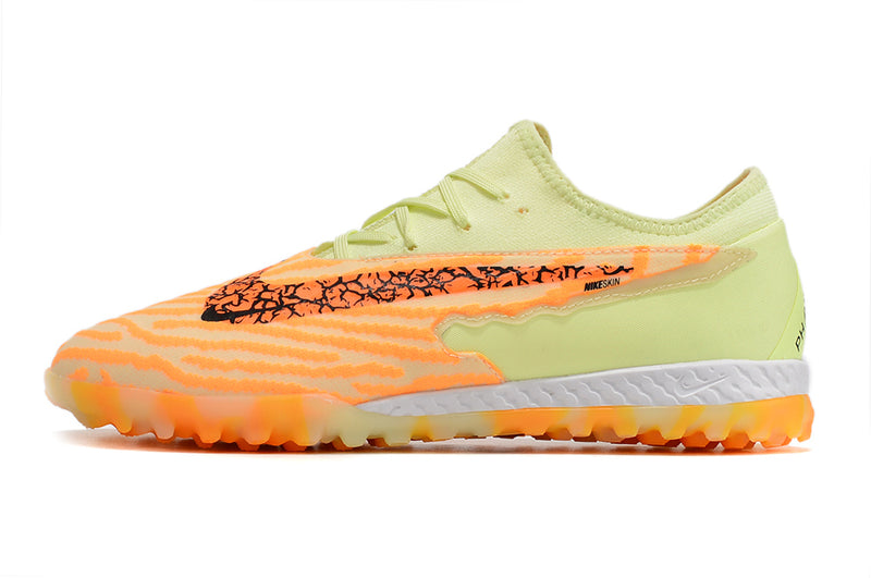 Chuteira de Campo Nike React Phantom GX Pro TF - Laranja/verde