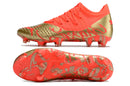 Chuteira de Campo Puma Future Z 1.3 Teazer FG - Laranja/Ouro escovado