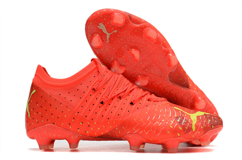 Chuteira de Campo Puma Future Z 1.3 Teazer FG - Laranja
