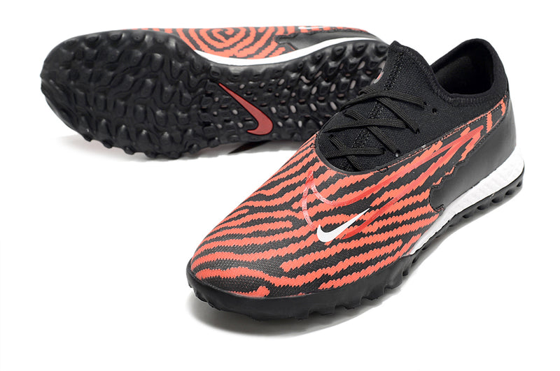 Chuteira de Campo Nike React Phantom GX Pro TF - Preto/Laranja