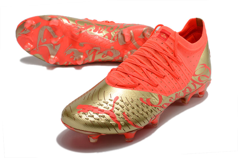 Chuteira de Campo Puma Future Z 1.3 Teazer FG - Laranja/Ouro escovado