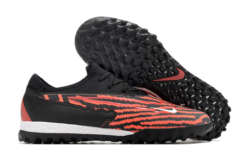 Chuteira de Campo Nike React Phantom GX Pro TF - Preto/Laranja
