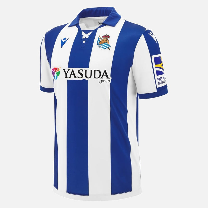 Camisa Real Sociedad l 24/25 - Torcedor Macron Masculina - Branca e azul