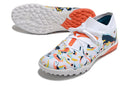 Chuteiras de futebol Puma Future X Powercat Tokyo Match TF - Branco/Laranja